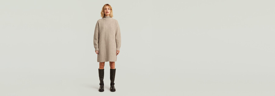 abito in maglia larga con trecce