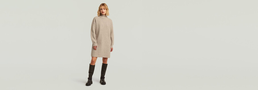 abito in maglia larga con trecce