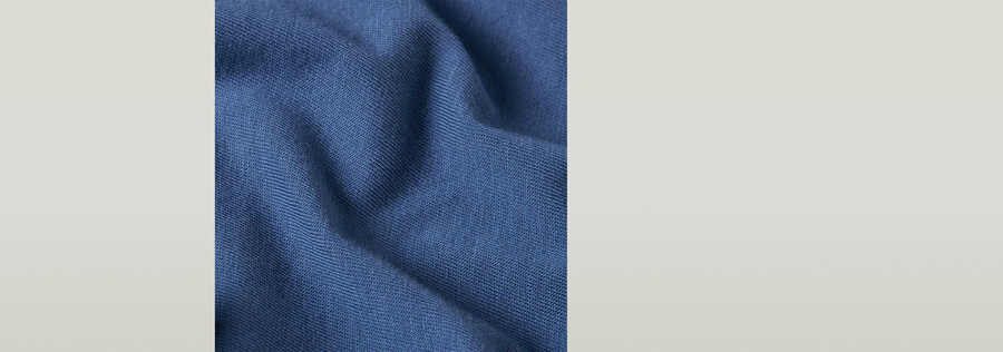 top largo con cucitura orizzontale