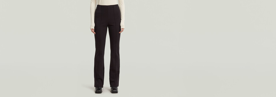 leggings con cerniera da motociclista