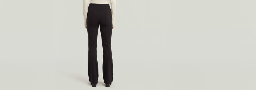 leggings con cerniera da motociclista