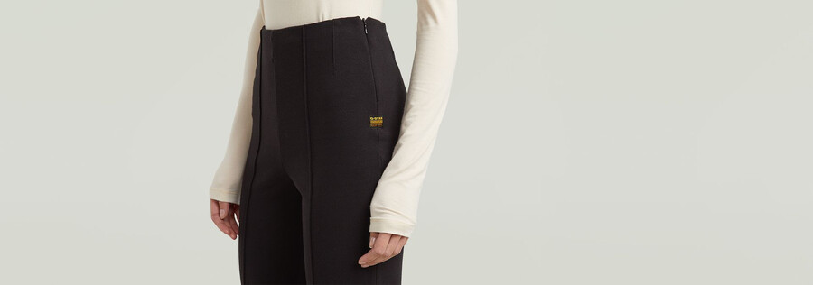 leggings con cerniera da motociclista