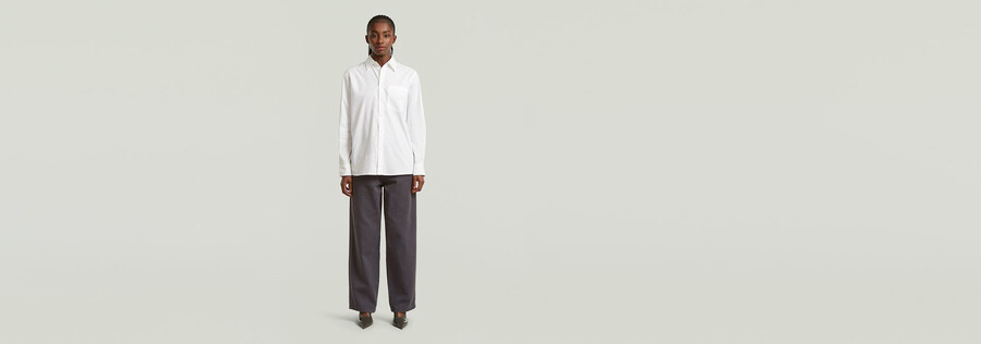 pantaloni larghi a pieghe