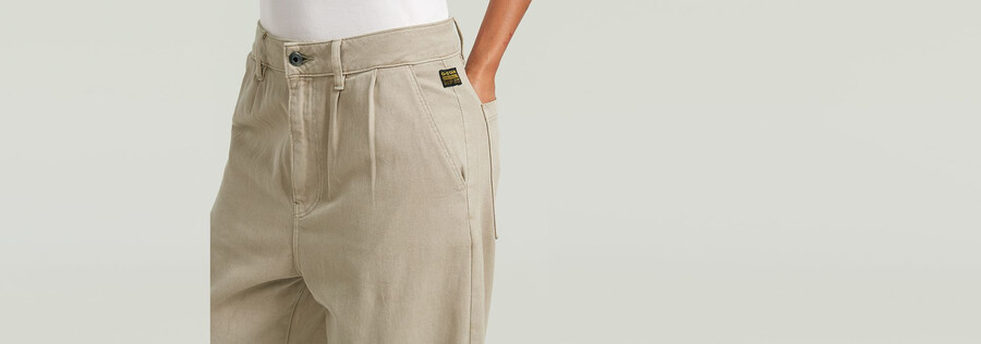 chino affusolato a pieghe