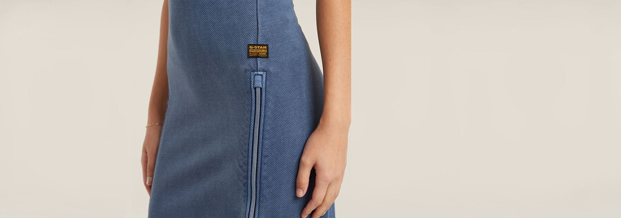 abito asimmetrico con zip sovratinto