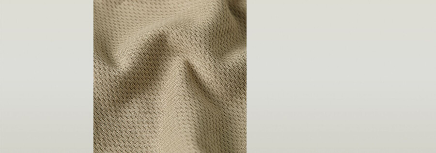 canotta aderente con zip asimmetrica