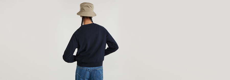 maglione con costruzione a manica