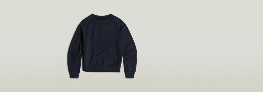 maglione con costruzione a manica