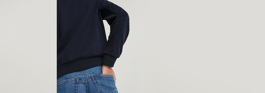 maglione con costruzione a manica