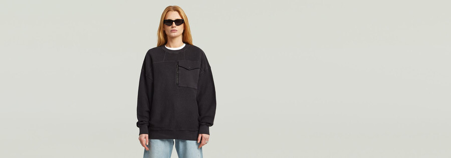 maglione oversize con tasche miste