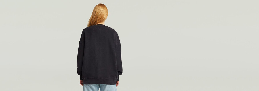 maglione oversize con tasche miste