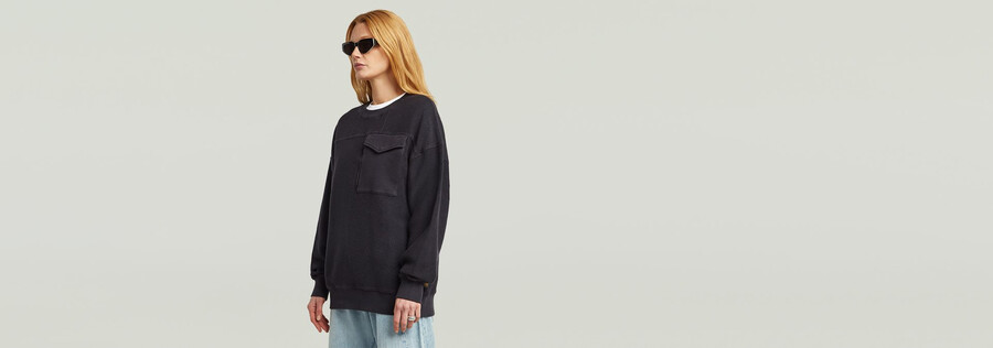 maglione oversize con tasche miste