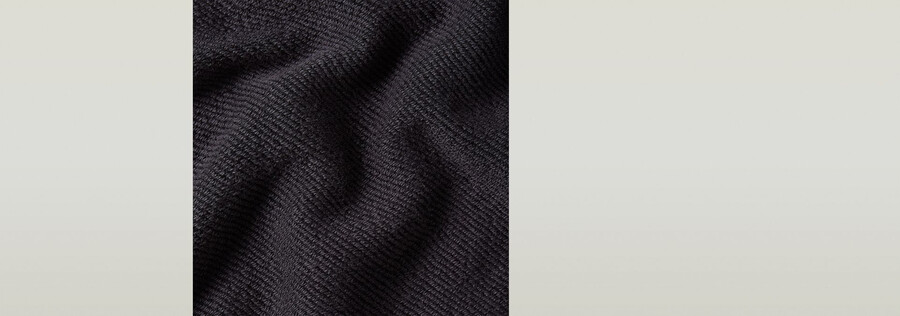maglione oversize con tasche miste