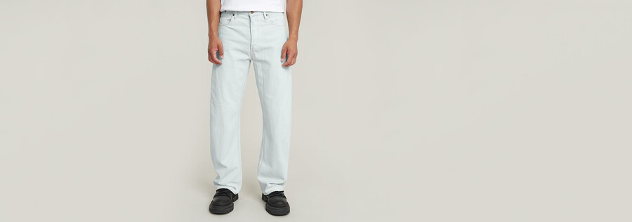 jeans larghi piegati
