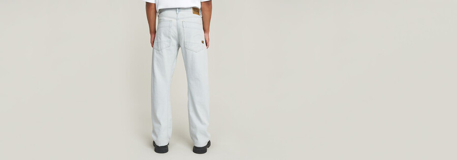 jeans larghi piegati