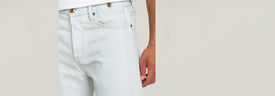 jeans larghi piegati