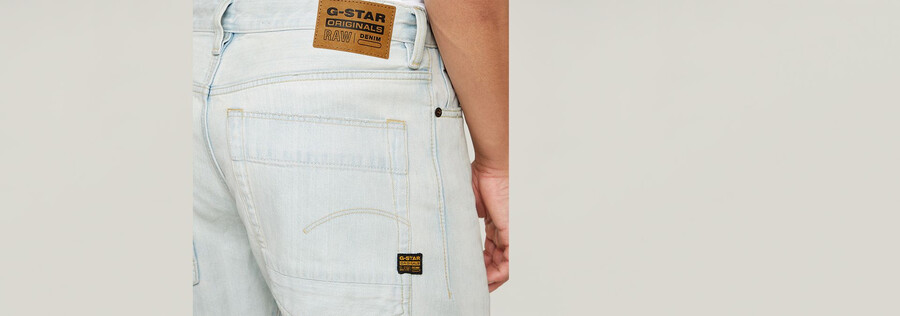 jeans larghi piegati