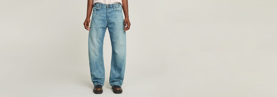 jeans larghi piegati