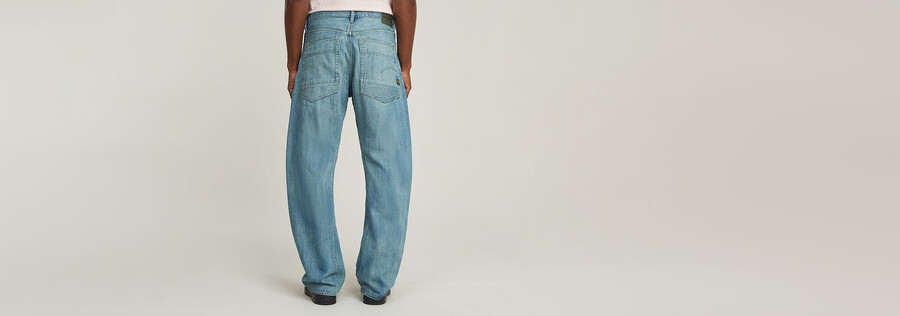 jeans larghi piegati