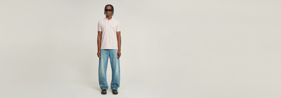 jeans larghi piegati