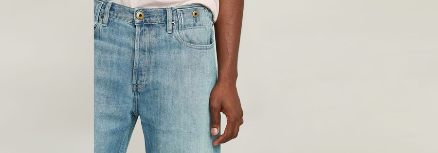 jeans larghi piegati