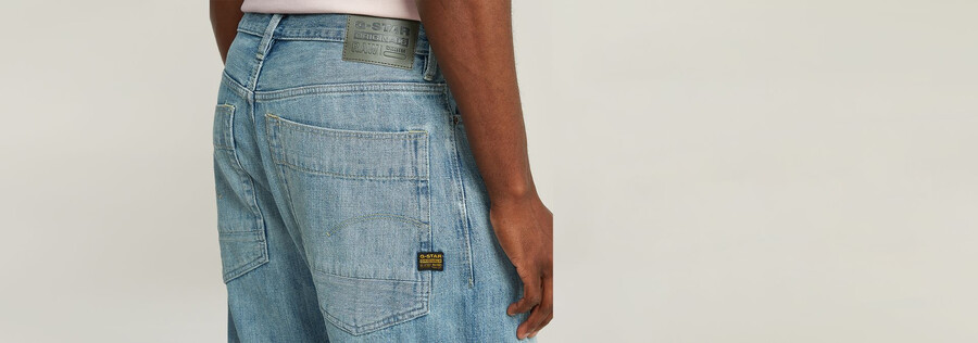 jeans larghi piegati