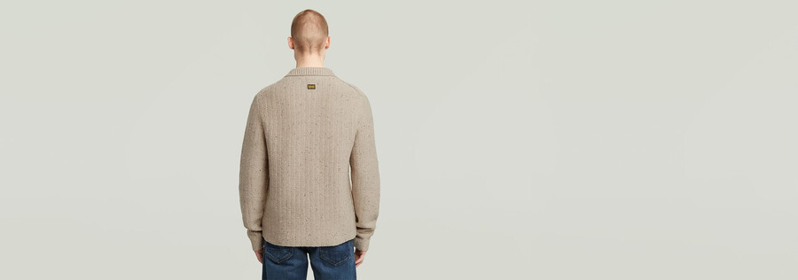 maglia con mezza zip e colletto polo