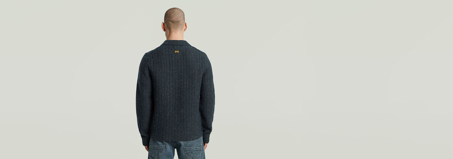 maglia con mezza zip e colletto polo