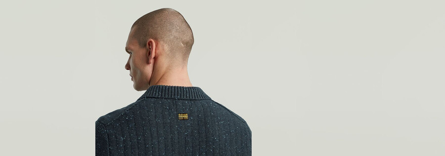 maglia con mezza zip e colletto polo