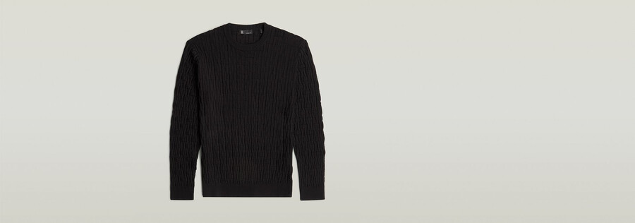maglione lavorato a maglia con struttura a catena