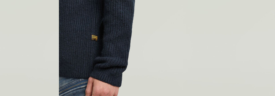 maglia con doppio collo e mezza zip