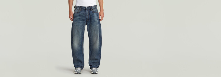 jeans larghi piegati
