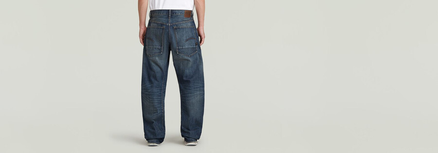 jeans larghi piegati