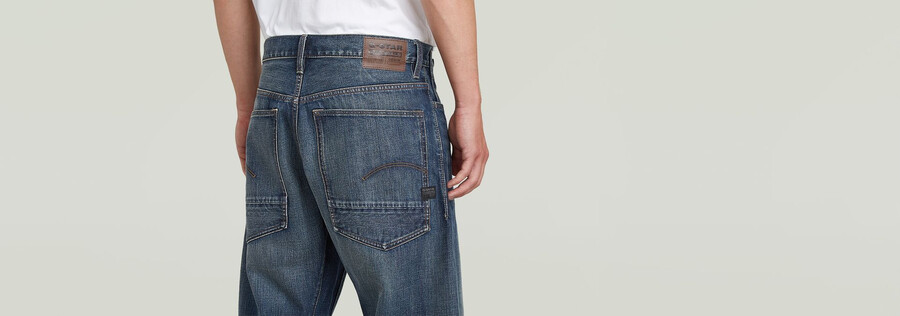jeans larghi piegati