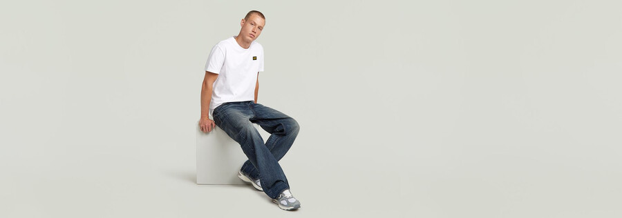jeans larghi piegati