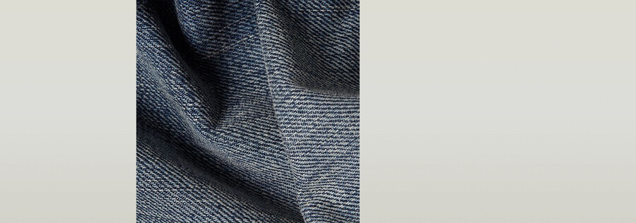 jeans larghi piegati