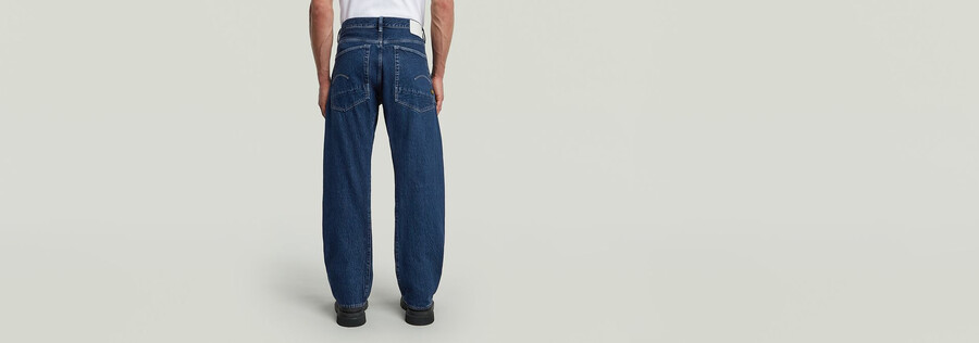 jeans larghi piegati