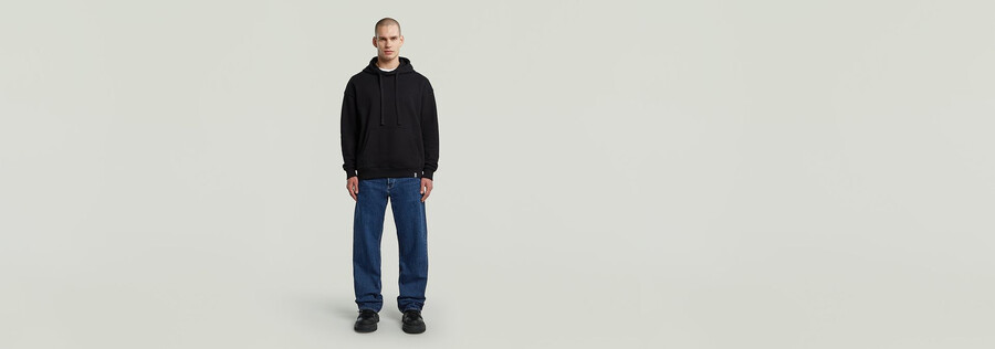 jeans larghi piegati