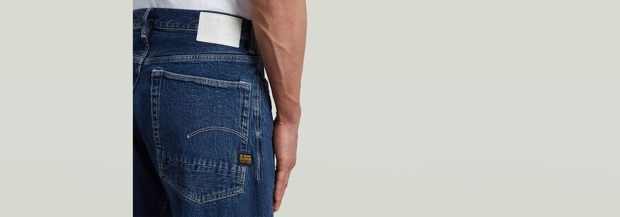 jeans larghi piegati