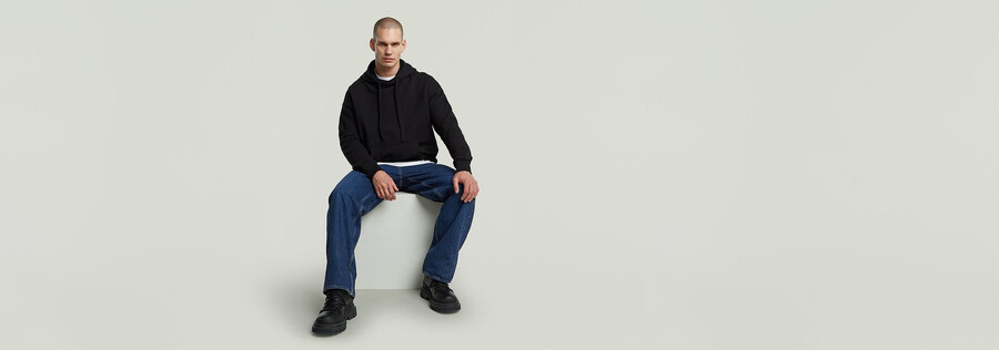 jeans larghi piegati