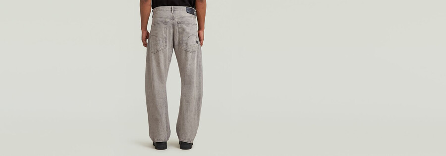 jeans larghi piegati