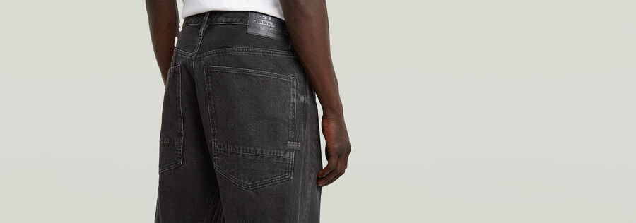 jeans larghi piegati