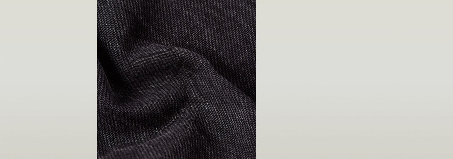 jeans larghi piegati