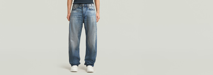 jeans larghi piegati