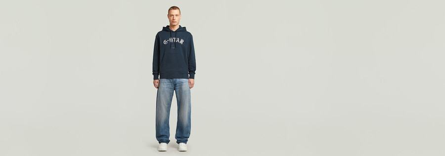 jeans larghi piegati