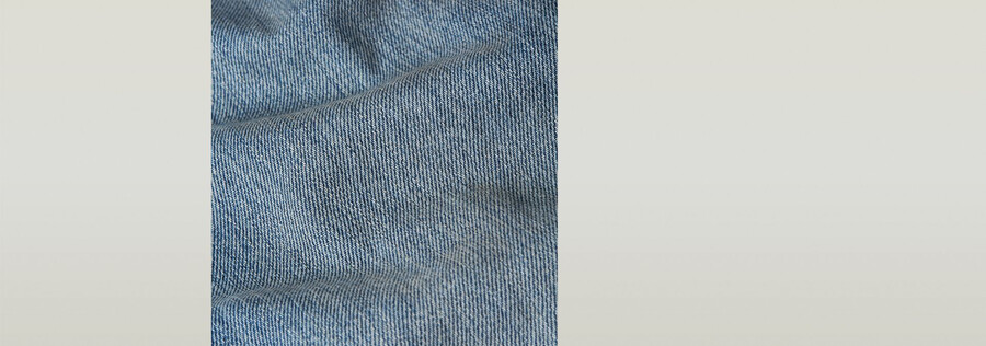 jeans larghi piegati