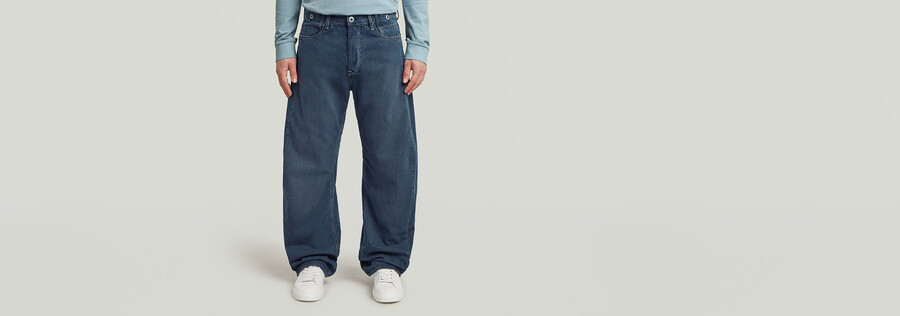 jeans larghi piegati