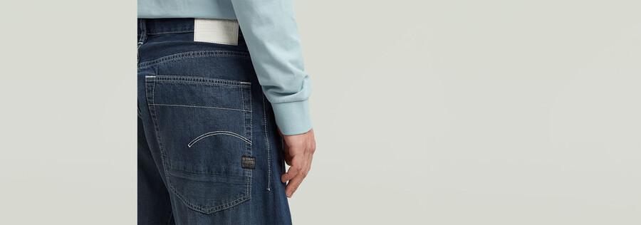 jeans larghi piegati