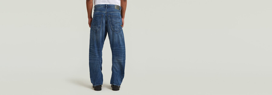 jeans larghi ad arco