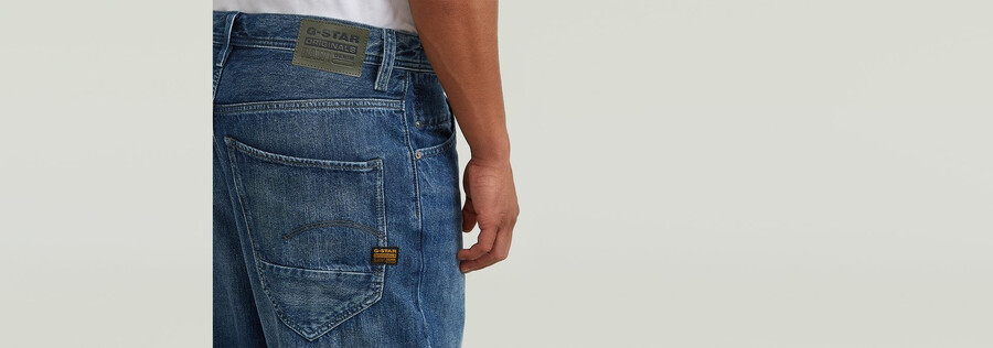 jeans larghi ad arco